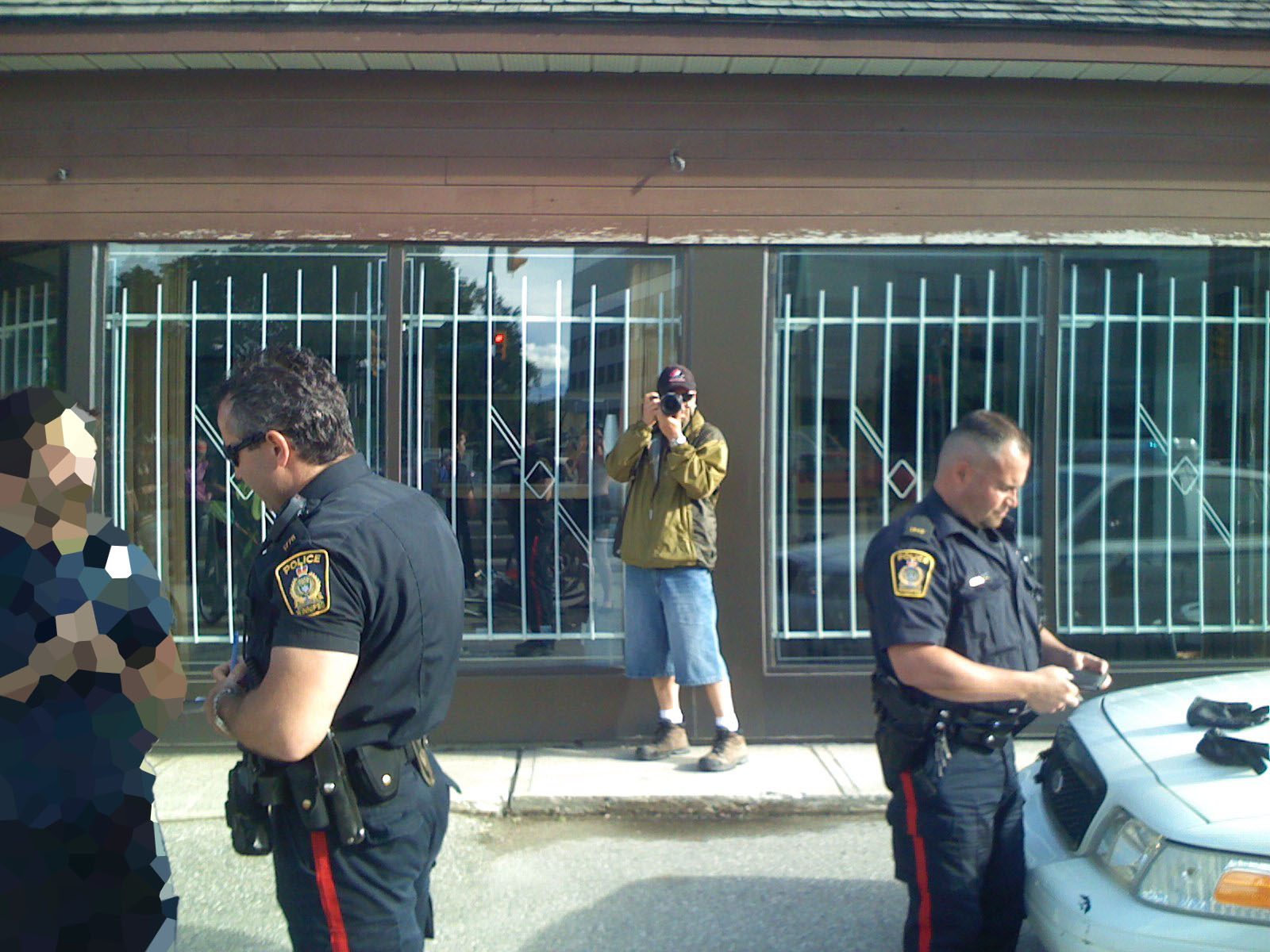 Winnipeg’s first World Naked Bike Ride incarnation: officer 1849 in a size war